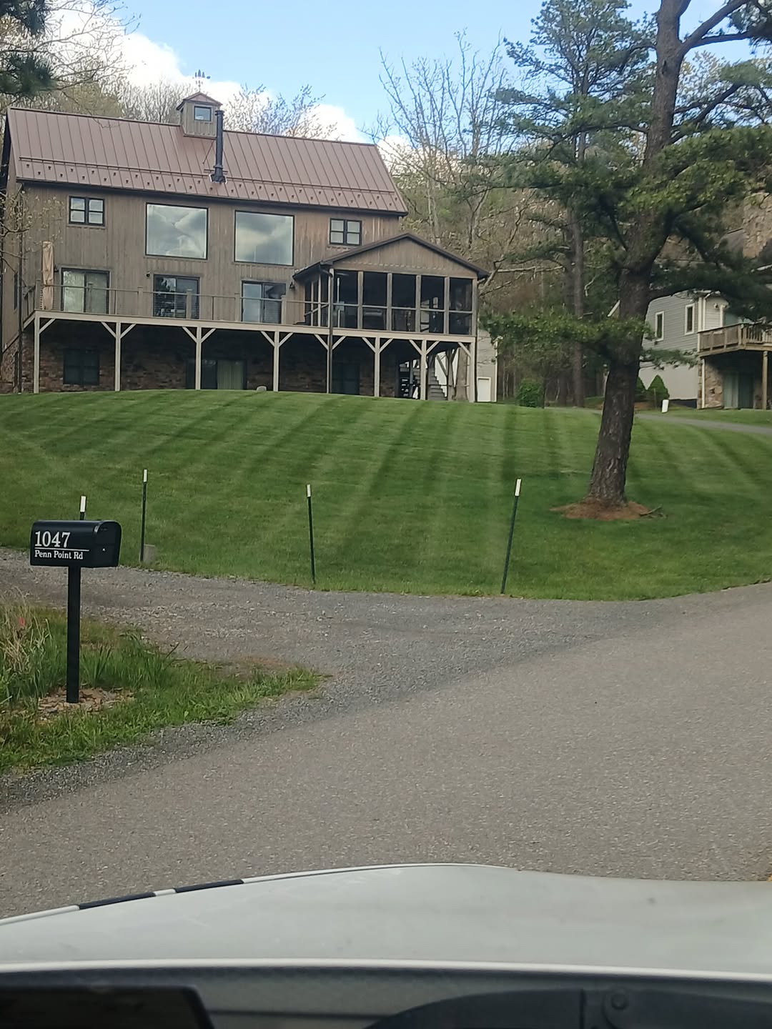Professionally mowed striped lawn at Deep Creek Lake property, Garrett County
