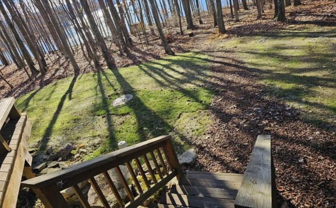 After fall leaf cleanup showing green lakeside yard at Deep Creek Lake