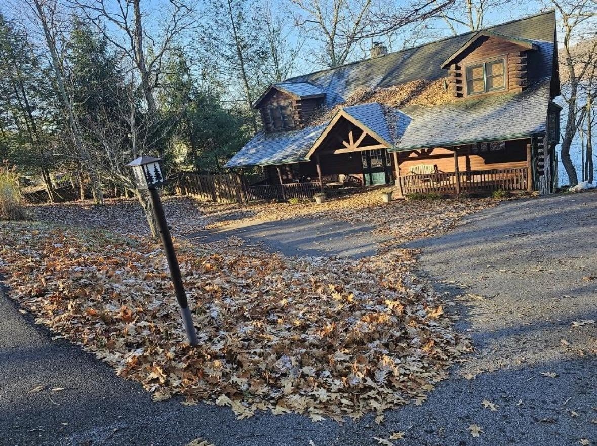 Before leaf removal at Deep Creek Lake cabin driveway